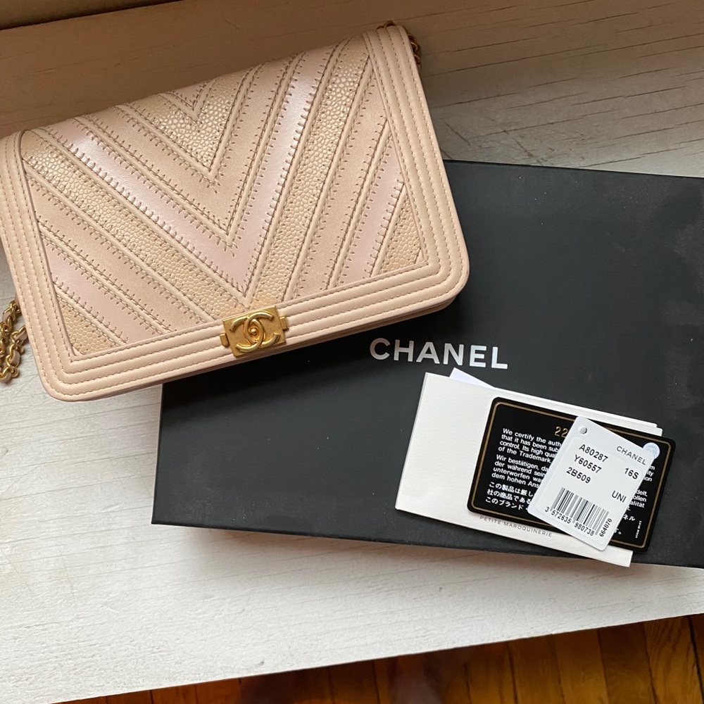 Pink Chanel wallet on a chain